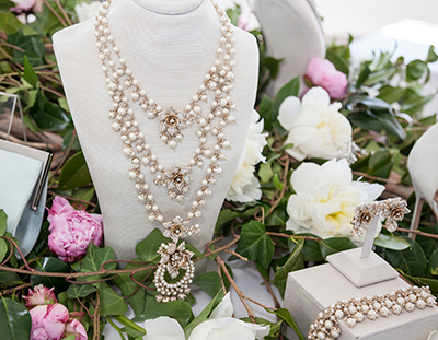 “Antique look” accessories make a bold statement with large rhinestones and pearls.